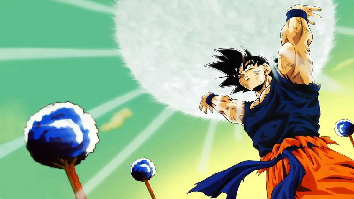 Goku, bras levé vers le ciel, rassemble l'énergie d'un Genkidama dans Dragon Ball Z