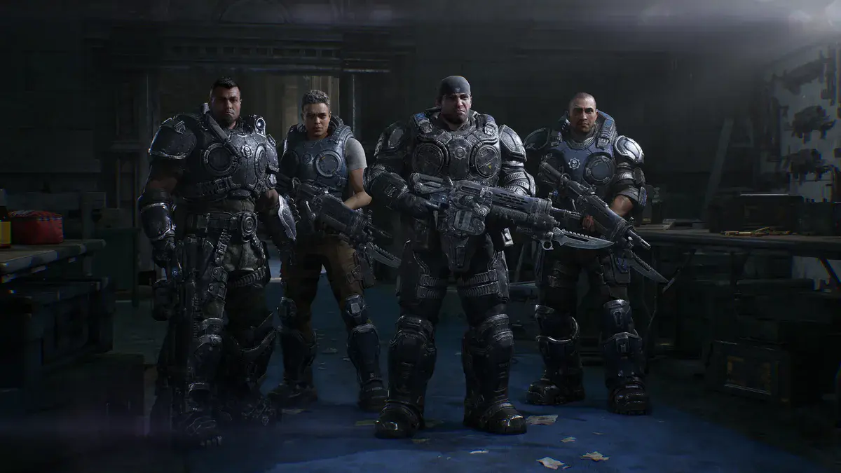 Marcus Fenix, bandana sur la tête, et Dom Santiago posent en armure avec deux autres soldats de la CGO dans Gears of War: E-Day