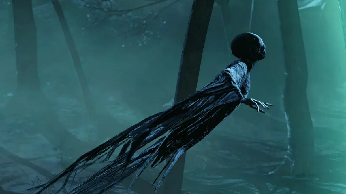 Un Détraqueur, silhouette en haillons aux mains décharnées, flotte entre les arbres d'une forêt brumeuse de l'univers Harry Potter