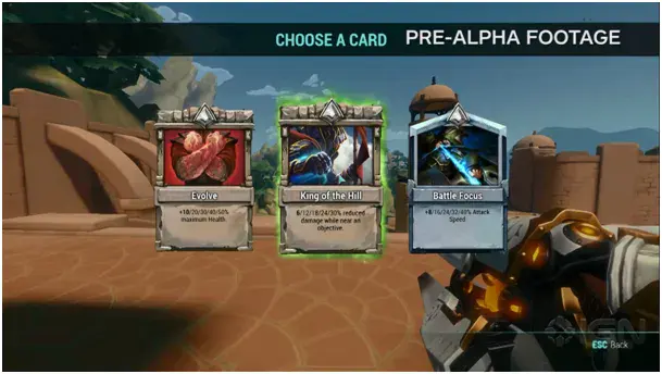 Paladins en pré-alpha : écran de choix entre trois cartes (Evolve, King of the Hill, Battle Focus)