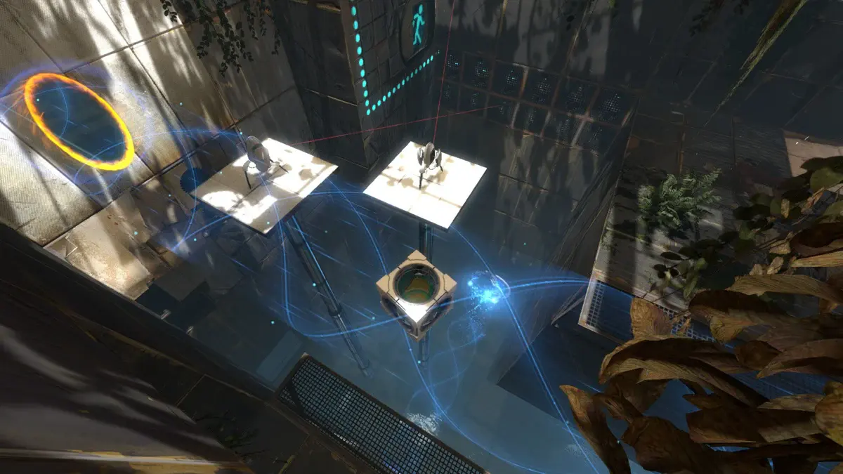 Tourelles et portail orange dans une salle de test de Portal 2